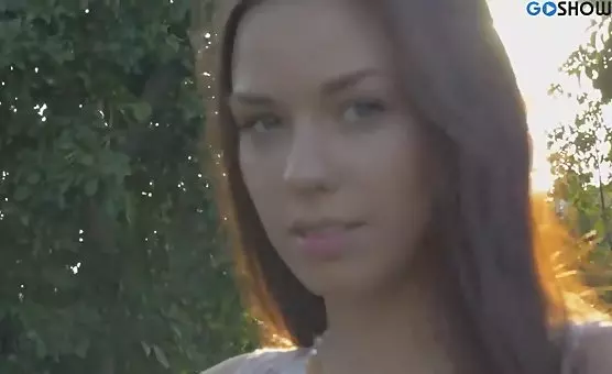 Brunette Teasing Outdoor Delights