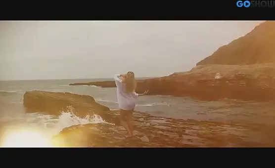 Blonde Dancing Fingers to Harmonic Pleasure